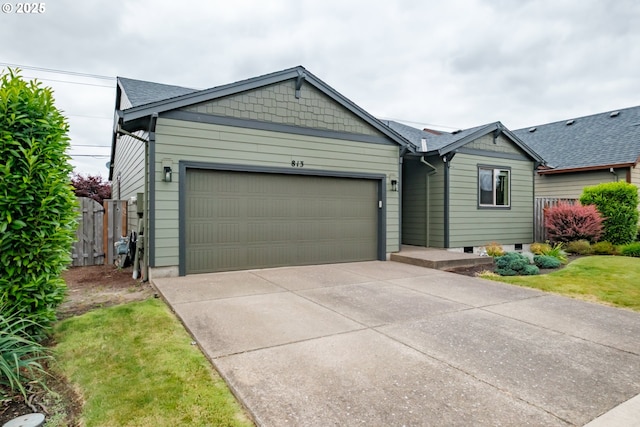 813 Pintail St, Silverton, OR 97381 - ranch-style home with a garage, concrete driveway, and a shingled roof