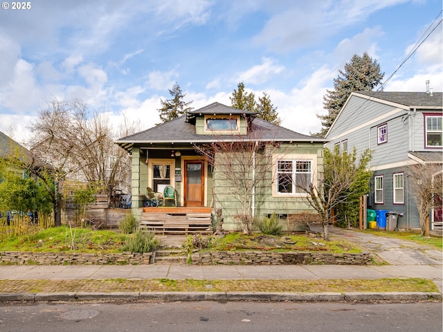 bungalow-style house featuring covered porch