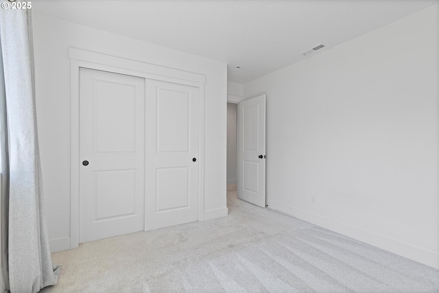 830 NE Buckthorn Dr, Estacada, OR 97023 - unfurnished bedroom with carpet floors, a closet, and baseboards