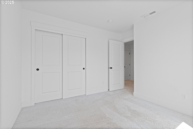 830 NE Buckthorn Dr, Estacada, OR 97023 - unfurnished bedroom featuring carpet, baseboards, and a closet