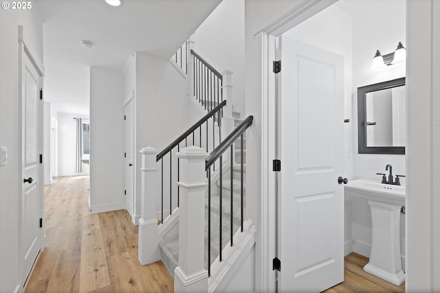 830 NE Buckthorn Dr, Estacada, OR 97023 - staircase with wood finished floors, recessed lighting, and baseboards
