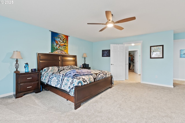 bedroom with carpet floors, baseboards, and ceiling fan