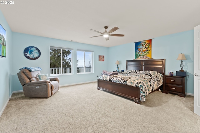 bedroom with baseboards, carpet floors, and ceiling fan