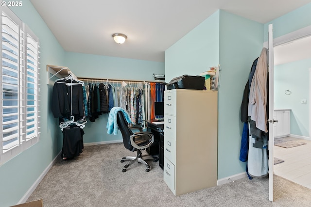 office with carpet floors and baseboards