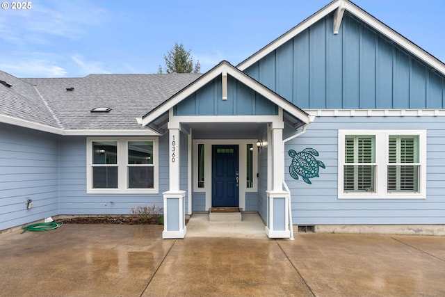 property entrance with board and batten siding