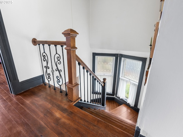 stairway with wood-type flooring