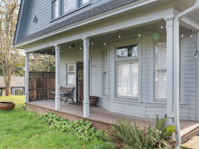 entrance to property featuring covered porch