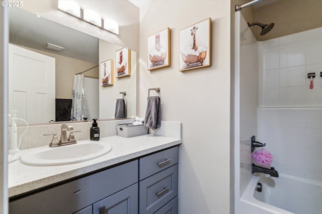 full bath featuring vanity and shower / tub combo with curtain