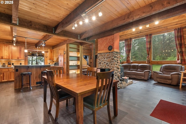67388 Timberline Rd, Summerville, OR 97876 - dining area with wood ceiling, beamed ceiling, dark wood-type flooring, rail lighting, and stairs