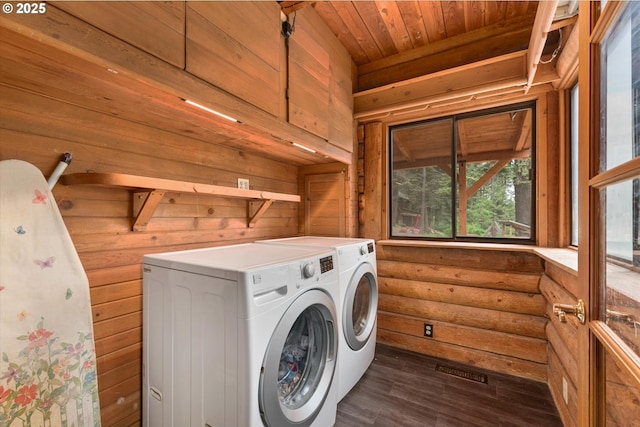 67388 Timberline Rd, Summerville, OR 97876 - laundry room with washer and dryer, dark wood-type flooring, cabinet space, and wooden ceiling