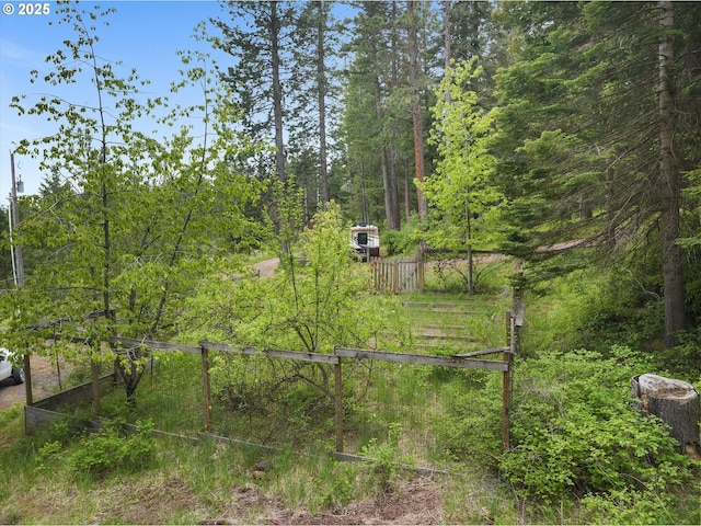 67388 Timberline Rd, Summerville, OR 97876 - view of yard with fence and a view of trees