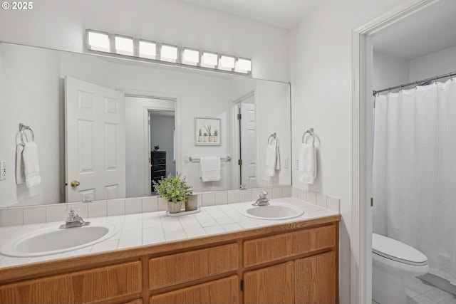3166 NE Glencoe Oaks Pl, Hillsboro, OR 97124 - bathroom featuring double vanity, tile patterned floors, and curtained shower