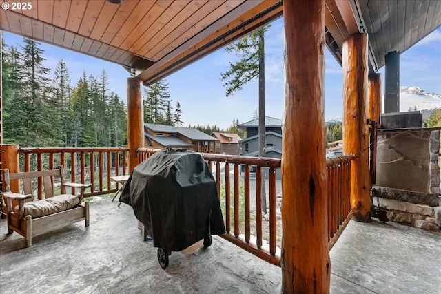 wooden terrace with area for grilling