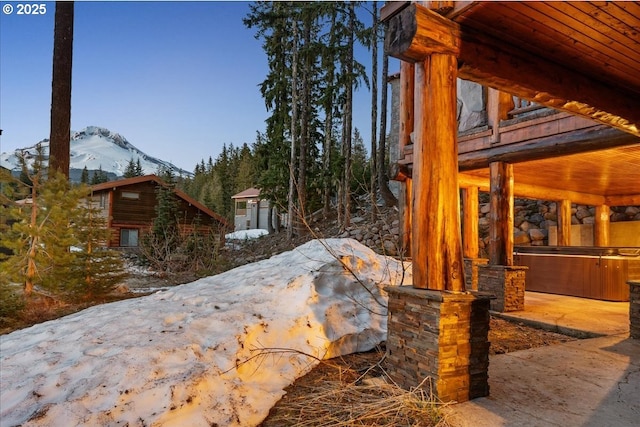 view of patio / terrace with a mountain view