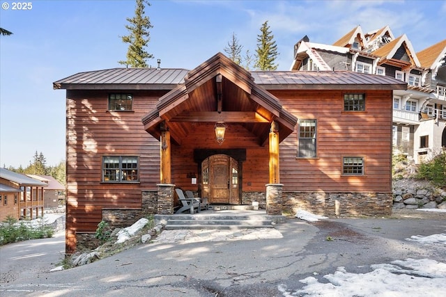 view of front of home featuring stone siding