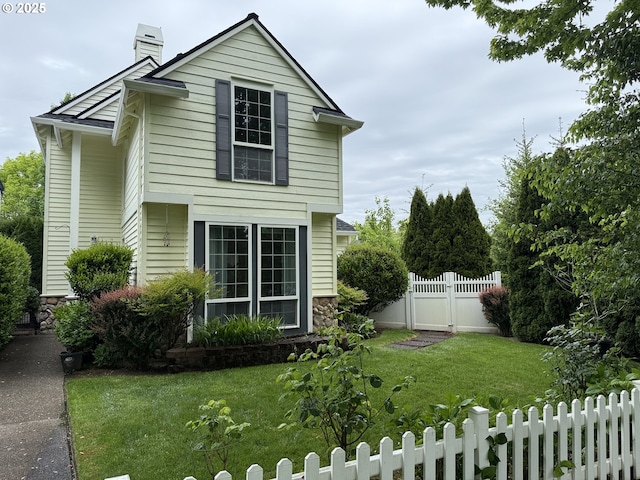 1000 NE Park Edge Cir, Hillsboro, OR 97124 - view of side of property with a chimney, stone siding, and a gate