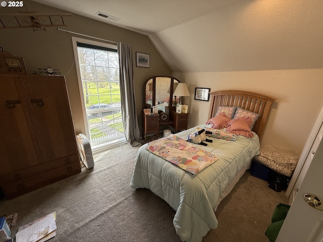 bedroom with lofted ceiling, access to exterior, visible vents, and carpet flooring