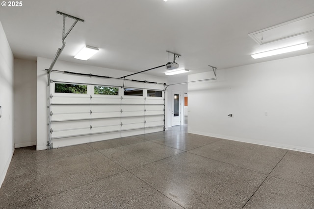 840 Sahalee Ct, Salem, OR 97306 - garage featuring a garage door opener and baseboards