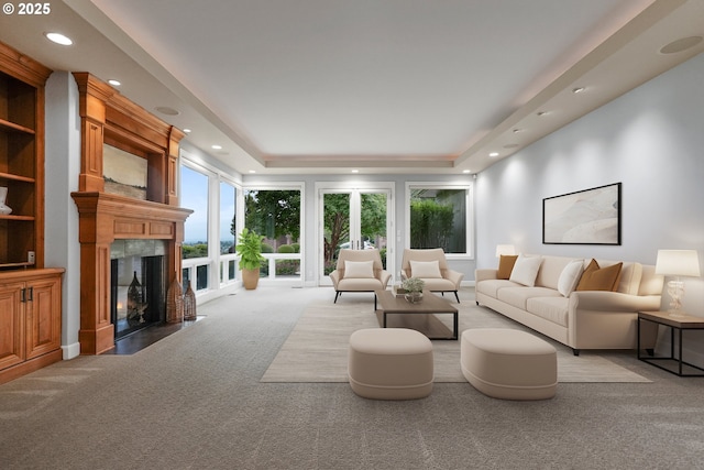 840 Sahalee Ct, Salem, OR 97306 - carpeted living room with a tray ceiling, recessed lighting, and a fireplace