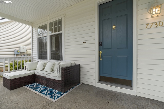 doorway to property featuring a porch