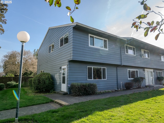 exterior space with a lawn