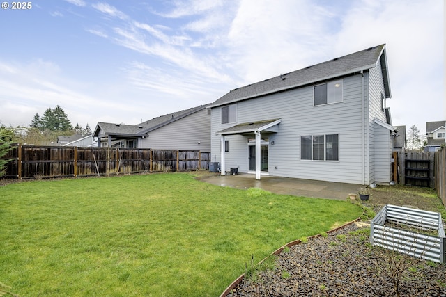 rear view of property featuring a yard, a patio area, a fenced backyard, and central air condition unit