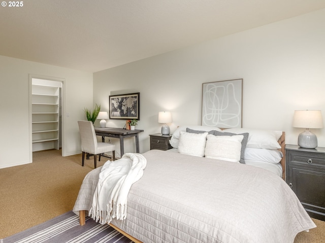 14066 Edenberry Dr, Lake Oswego, OR 97035 - carpeted bedroom featuring baseboards, a walk in closet, and a closet