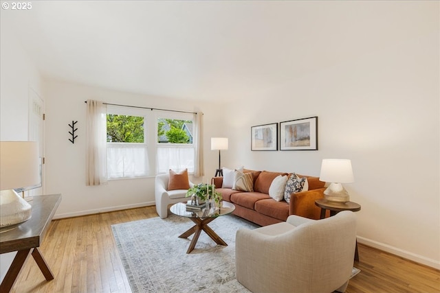 5310 NE 10th Ave, Portland, OR 97211 - living room featuring baseboards and light wood finished floors