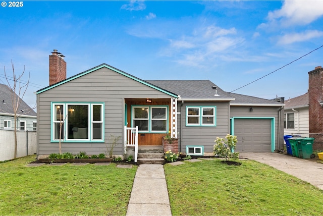 view of front of house featuring a garage, concrete driveway, a front lawn, and fence