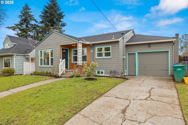 view of front of property featuring a shingled roof, fence, a front yard, driveway, and an attached garage