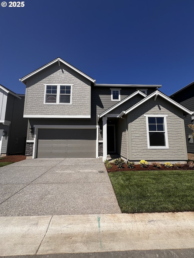 11016 NE 131st Ct, Vancouver, WA 98682 - view of front of home featuring a garage, driveway, and a front lawn