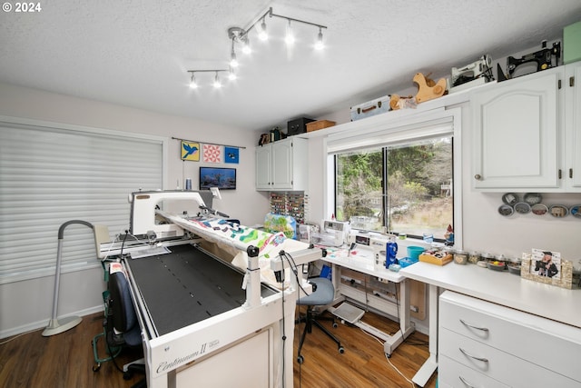 office area featuring a textured ceiling and wood finished floors