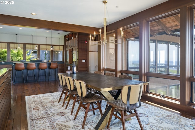 7850 Brooten Mountain Loop, Pacific City, OR 97135 - dining space with a chandelier, dark wood-style flooring, and recessed lighting