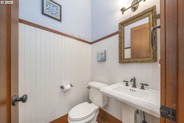 7850 Brooten Mountain Loop, Pacific City, OR 97135 - half bathroom featuring toilet and a sink