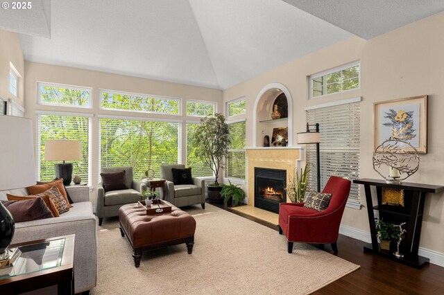 sunroom / solarium featuring a notable chandelier