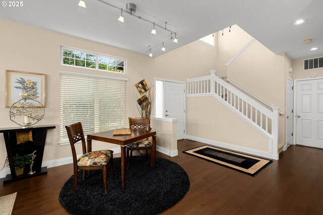 dining room featuring recessed lighting, visible vents, wood finished floors, and stairway