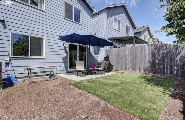 7407 NE 136th Ave, Vancouver, WA 98682 - rear view of house with a patio