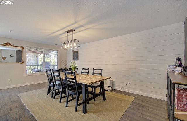 1812 NW 14th St, Battle Ground, WA 98604 - dining room with dark wood finished floors and wood walls