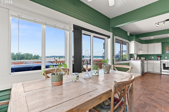 160 S 1st St, Saint Helens, OR 97051 - dining space featuring plenty of natural light and dark stone finish flooring