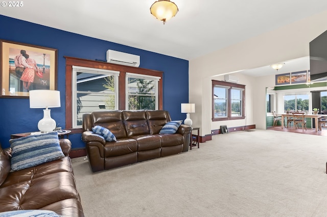 160 S 1st St, Saint Helens, OR 97051 - carpeted living area featuring a wall unit AC and baseboards