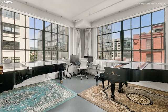 1314 NW Irving St Unit 510, Portland, OR 97209 - office area featuring concrete flooring and healthy amount of natural light