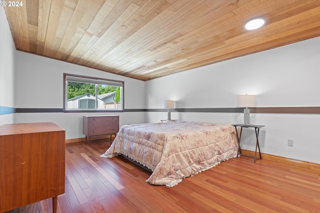 1833 SE 117th Ave, Portland, OR 97216 - bedroom with wood ceiling, baseboards, and wood-type flooring