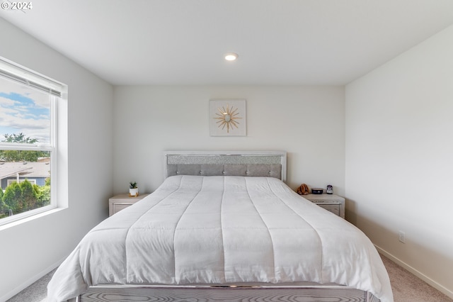 carpeted bedroom with baseboards and recessed lighting