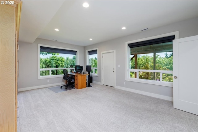 office area with visible vents, baseboards, recessed lighting, and light colored carpet