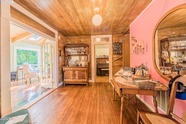 2165 NE E Devils Lake Rd, Otis, OR 97368 - home office featuring wood ceiling, hardwood / wood-style flooring, and wood walls