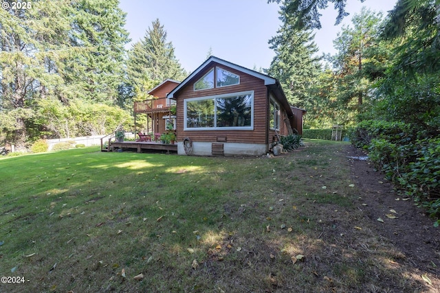 2165 NE E Devils Lake Rd, Otis, OR 97368 - rear view of house featuring a wooden deck