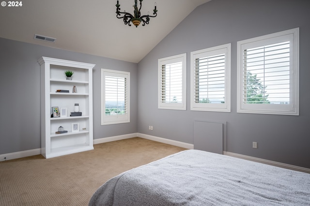 3232 NW Spencer St, Portland, OR 97229 - carpeted bedroom with vaulted ceiling and a chandelier