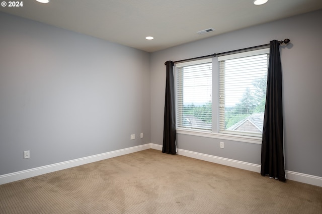 3232 NW Spencer St, Portland, OR 97229 - unfurnished room with light colored carpet and recessed lighting