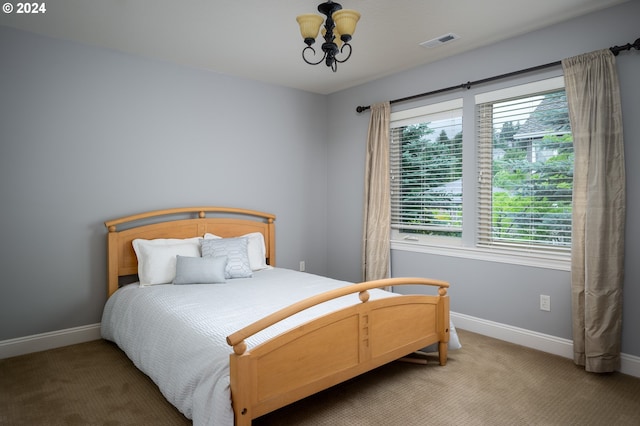 3232 NW Spencer St, Portland, OR 97229 - bedroom with a chandelier and carpet floors