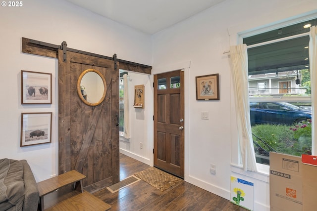 709 10th St, Oregon City, OR 97045 - entryway with healthy amount of natural light, wood finished floors, a barn door, and baseboards